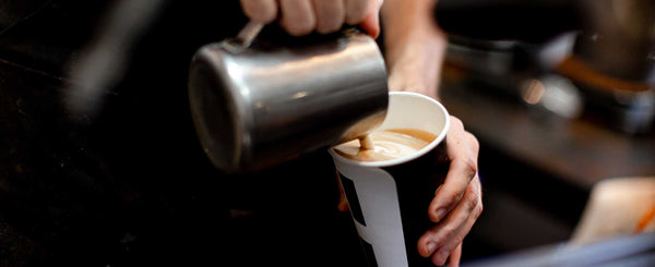 Pouring a latte to go